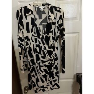 h&m black and white long sleeve dress Ladies - Black/Zebra print Cotton Wrap - Size: L shaped neckline and a wrap front with wide ties at one side H&M Dress Womens XL Black